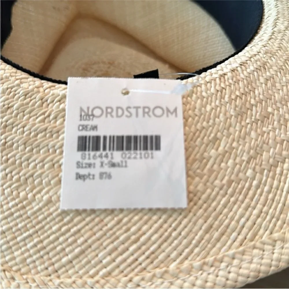 Gladys Tamez straw hat